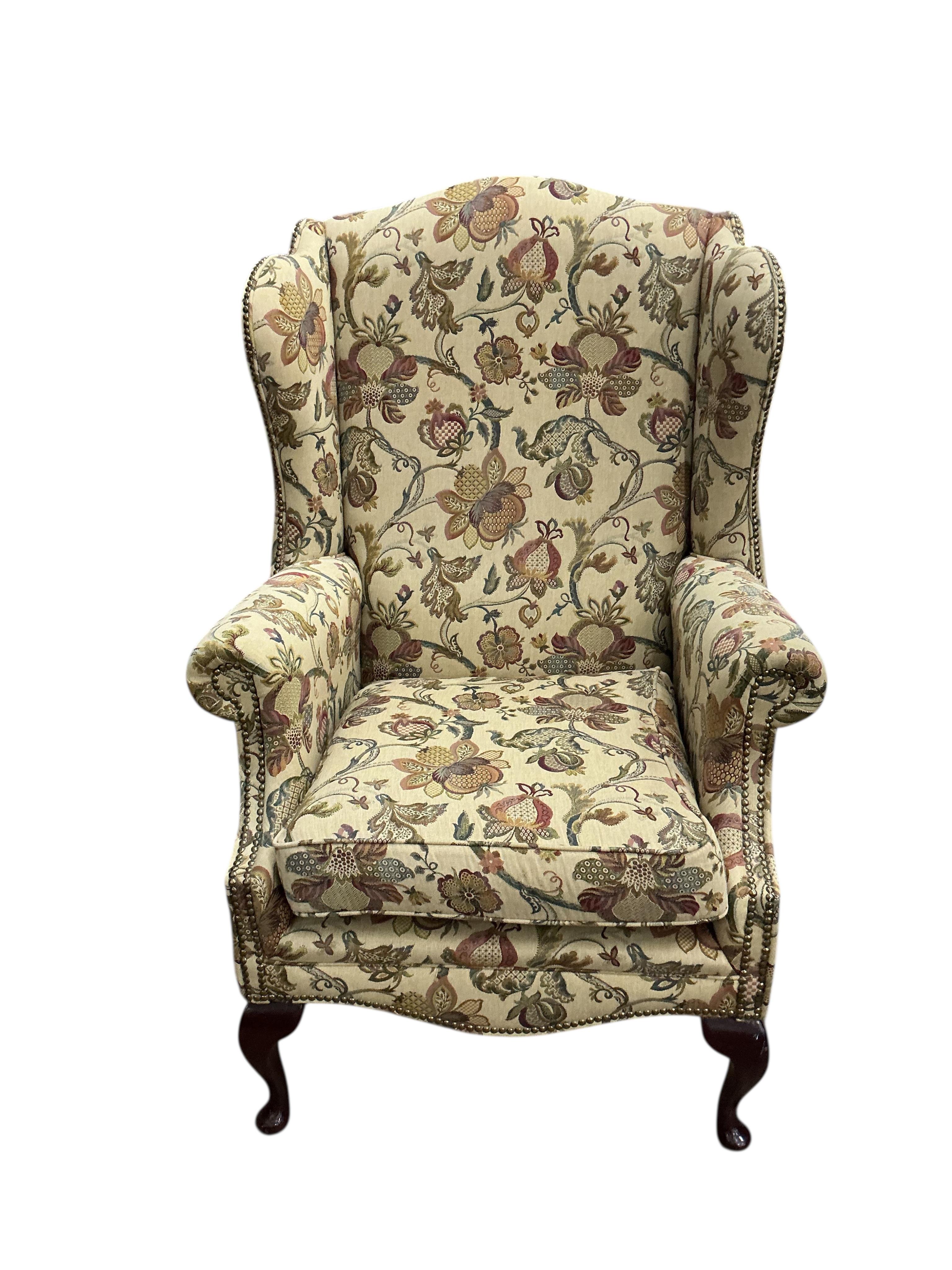 A pair of George III style upholstered wing armchairs, width 80cm, depth 74cm, height 120cm